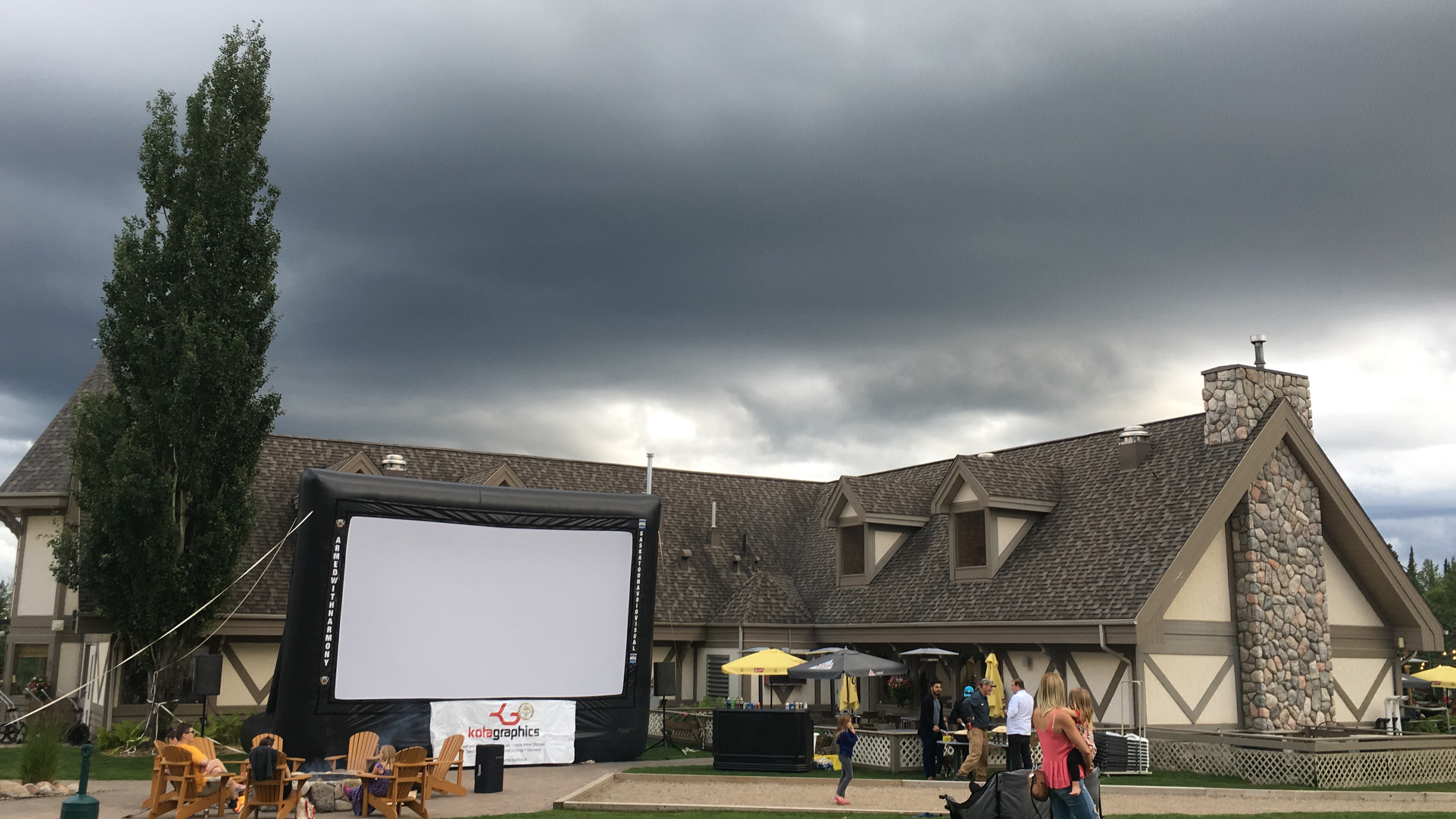 Saskatoon Saskatchewan YXE Pop Up Drive In Movie Screen Outdoor Theatre Cinema Under The Stars Armed With Harmony